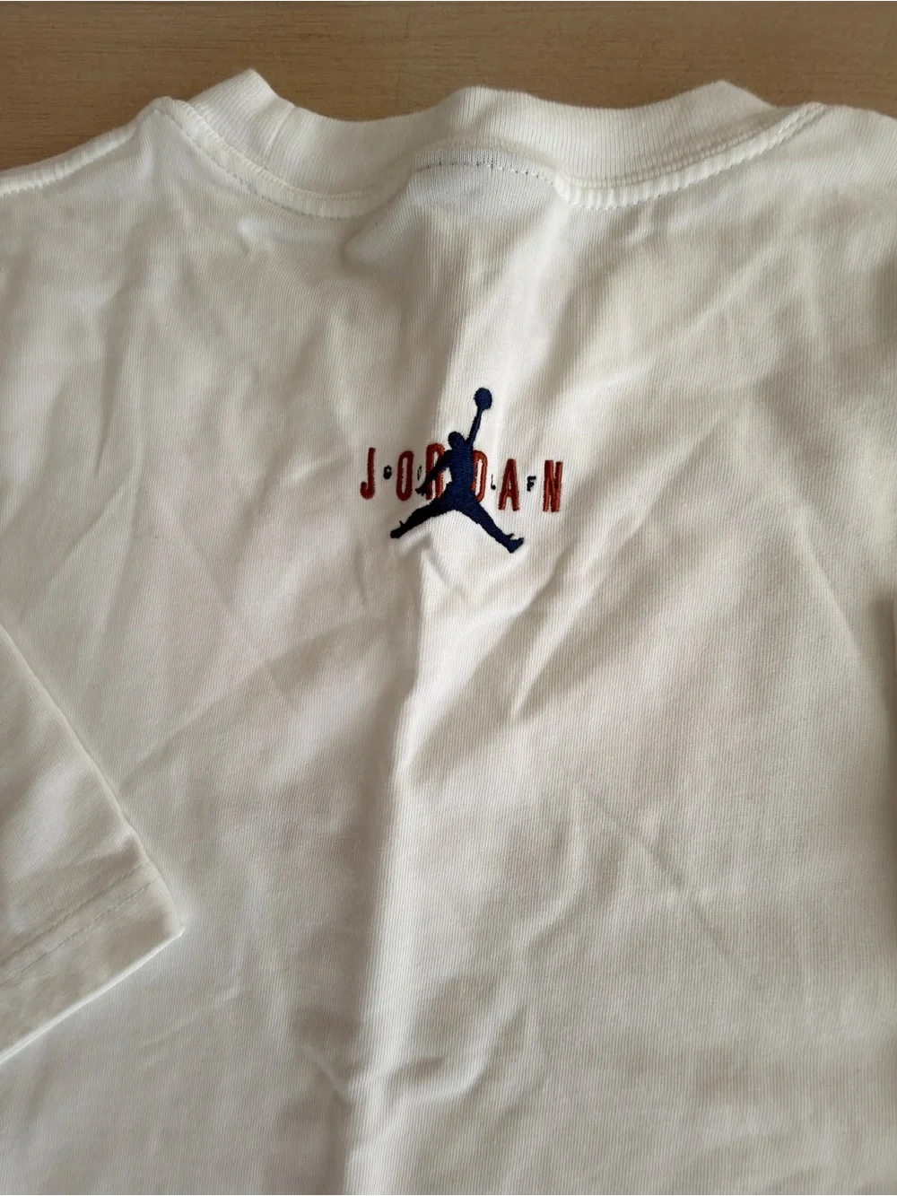 Jordan White Eastside Golf Tee with Center Golfer Graphic - Size XL